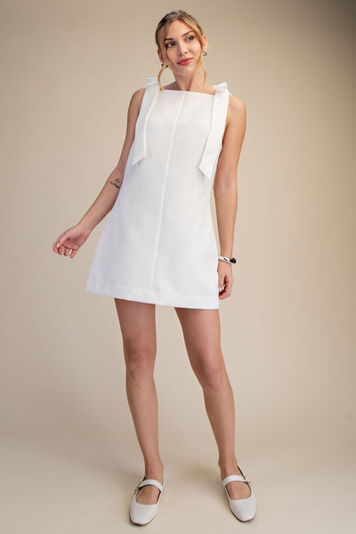 Vestido blanco moños