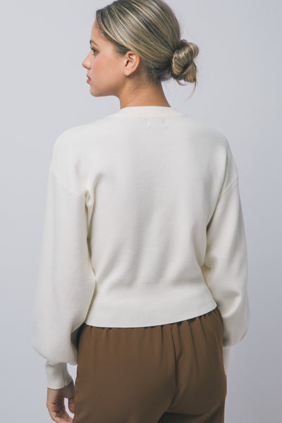 Suéter beige manga