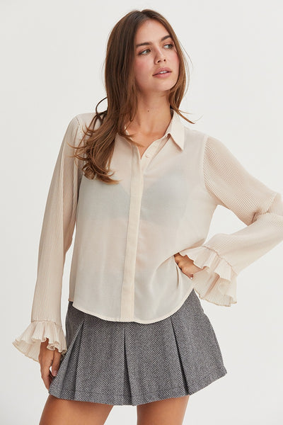 Blusa beige manga plisada