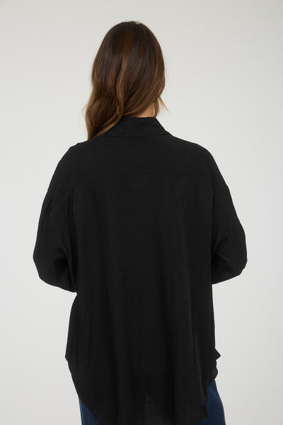 Blusa negra botones