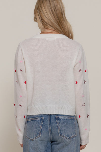 Suéter blanco corazón