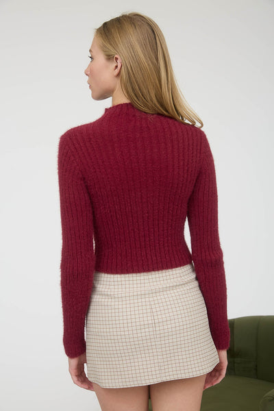 Suéter vino corto
