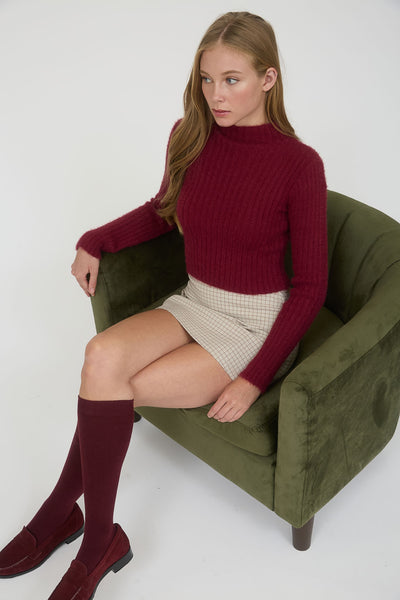Suéter vino corto
