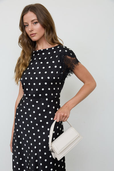 Vestido negro lunares