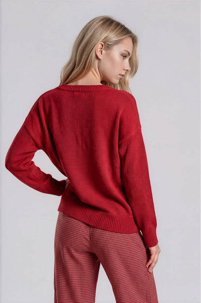 Suéter rojo oso