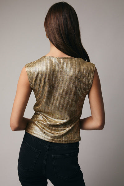 Blusa dorada metalica