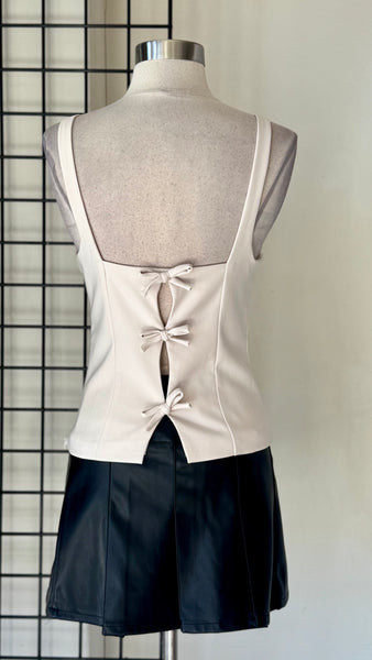Blusa beige moños