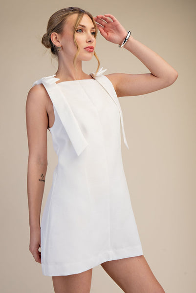 Vestido blanco moños
