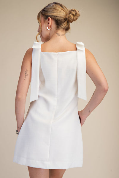 Vestido blanco moños
