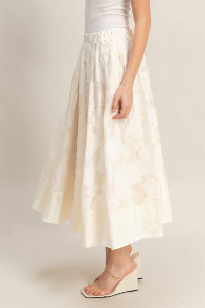 Falda beige a media pierna