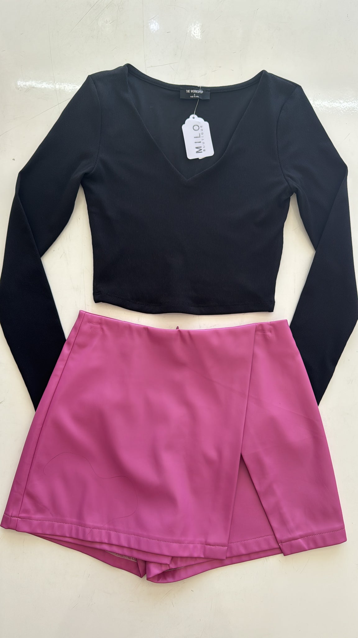 FALDA SHORT ROSA ABIERTO