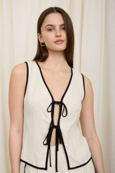 Blusa beige raya chaleco