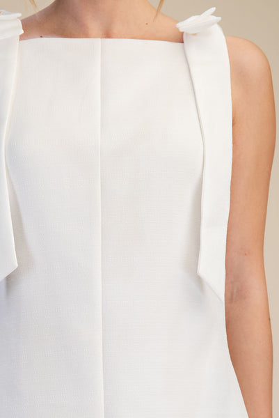 Vestido blanco moños