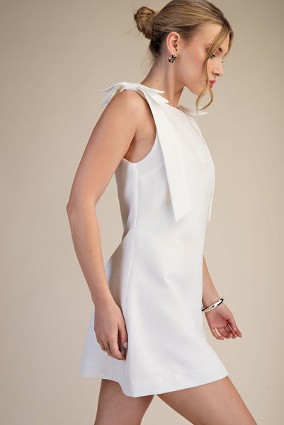 Vestido blanco moños