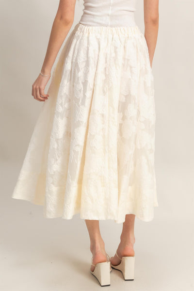 Falda beige a media pierna