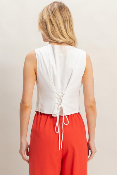 Chaleco blanco botón