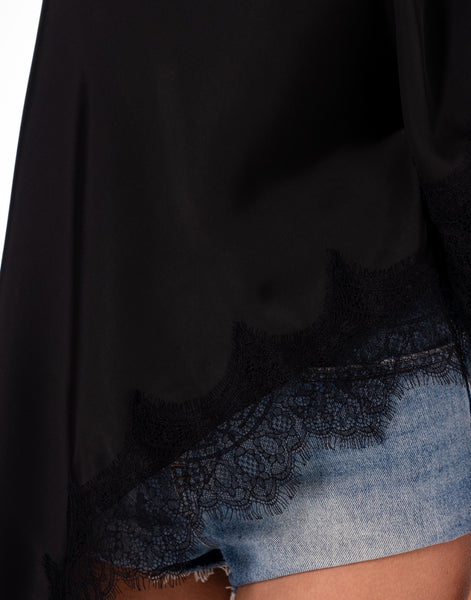 Blusa negra capa