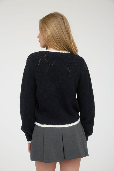 Suéter negro botones