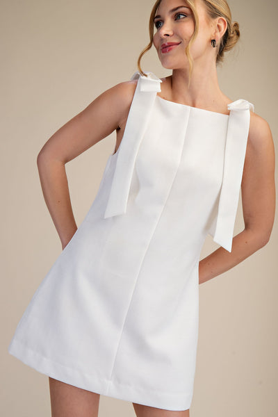 Vestido blanco moños