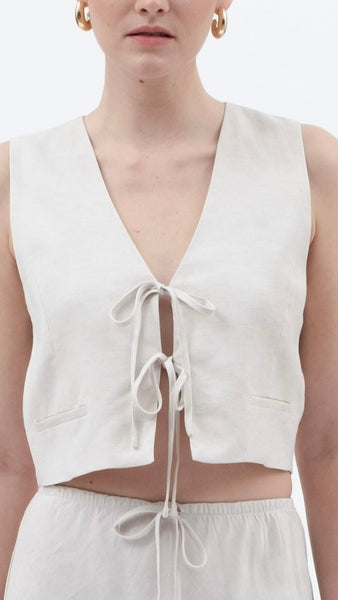 Chaleco beige moño