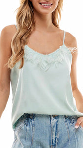 Blusa plumas