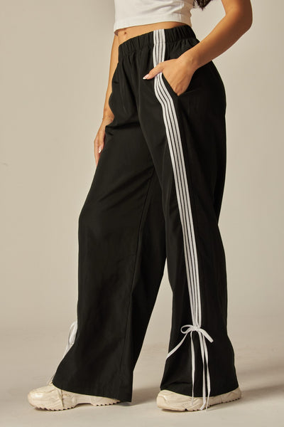 Pantalón negro raya moño