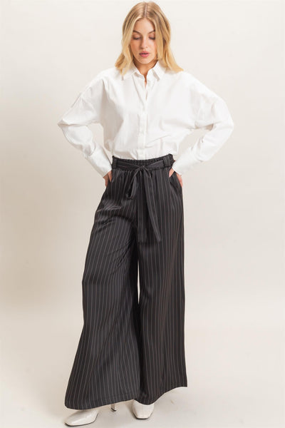 Pantalón negro raya