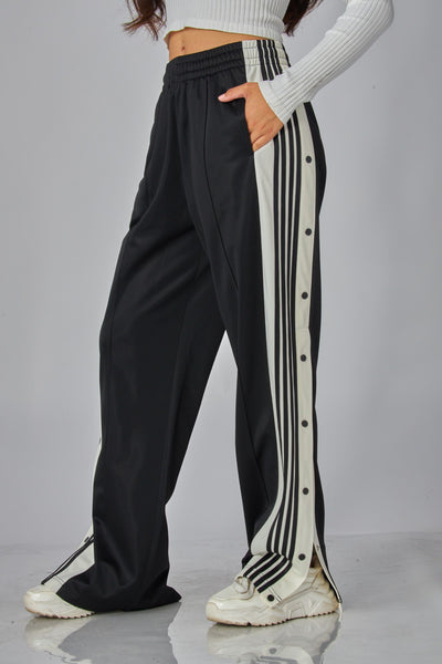 Pantalón negro raya botón
