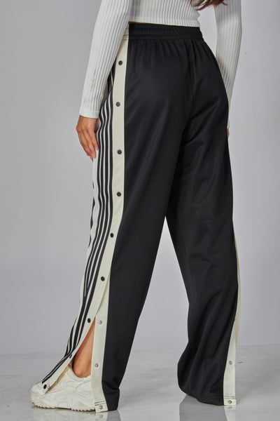 Pantalón negro raya botón