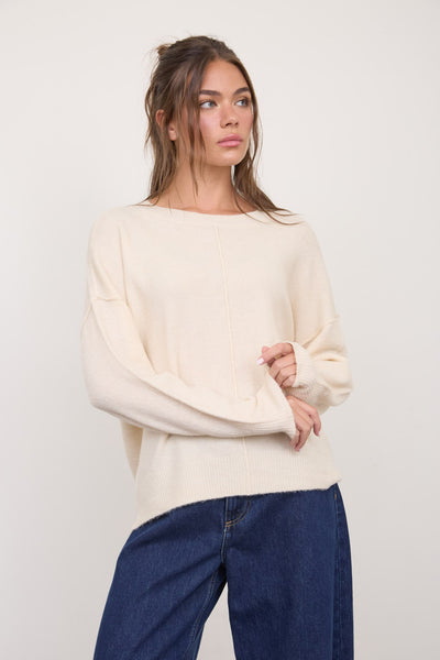 Suéter beige raya