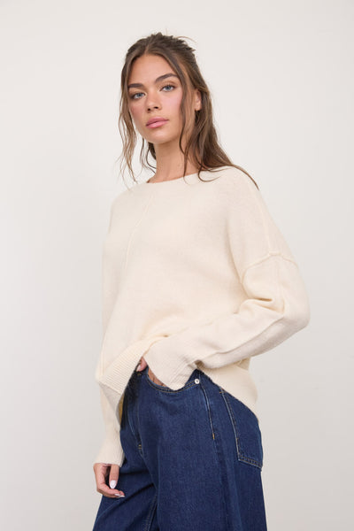 Suéter beige raya