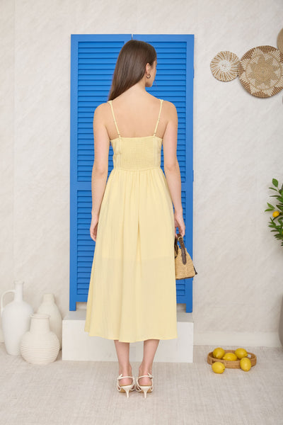 Vestido amarillo a media pierna