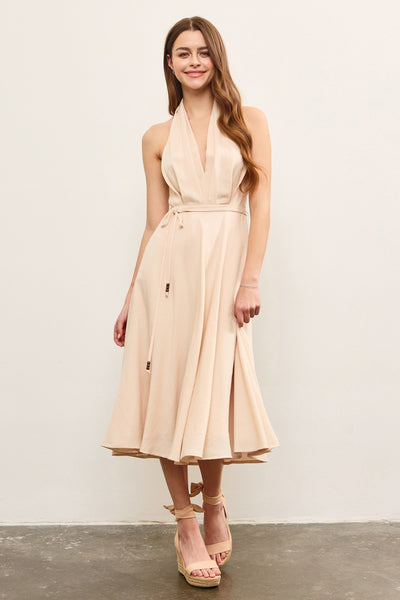 Vestido. beige a media pierna