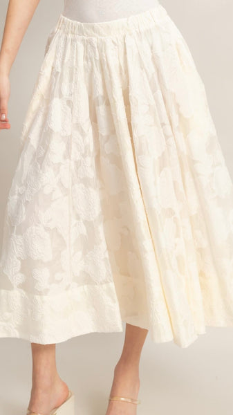 Falda beige a media pierna
