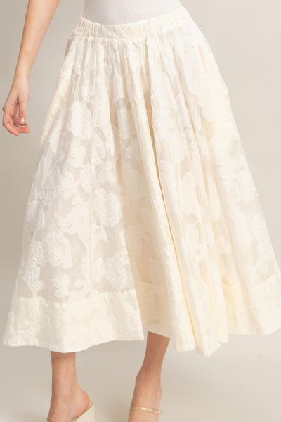 Falda beige a media pierna